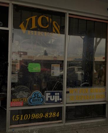 Vic's Bikes storefront window